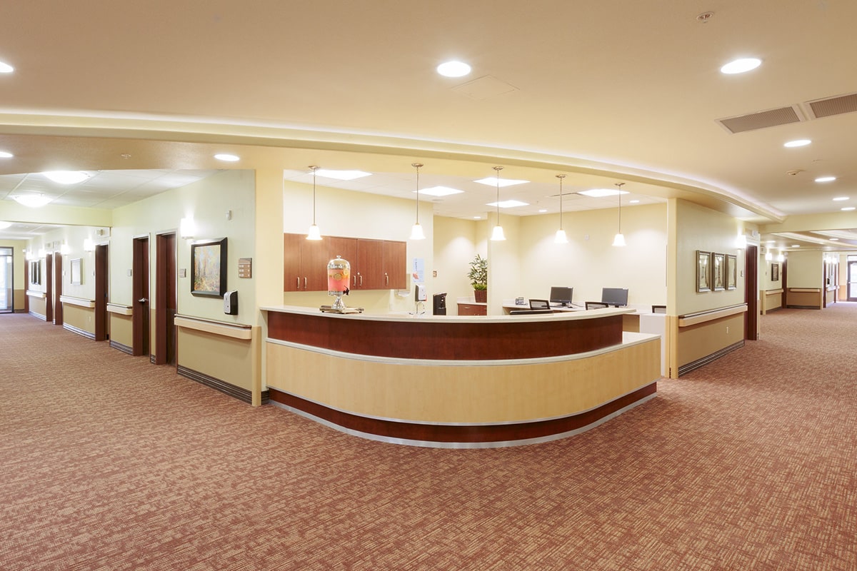 Front desk at Canyon Vista Post Acute with carpeted floors